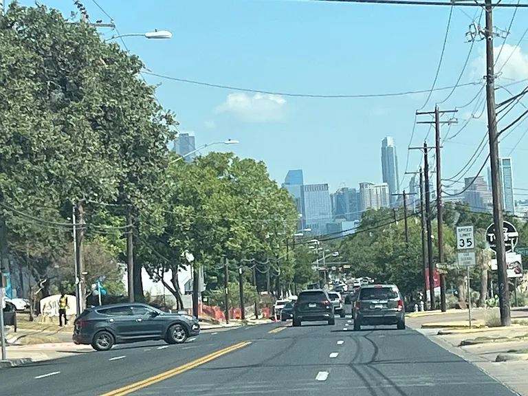 2 miles to downtown on bus line.