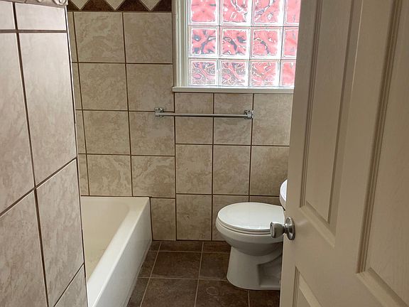 2nd bathroom with tub and shower