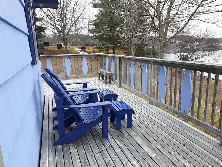 Deck wraps around living room and master bedroom.