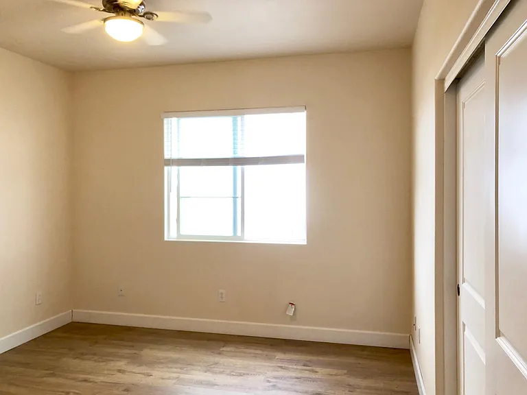 Master's Bedroom with Ceiling Fan and Closet