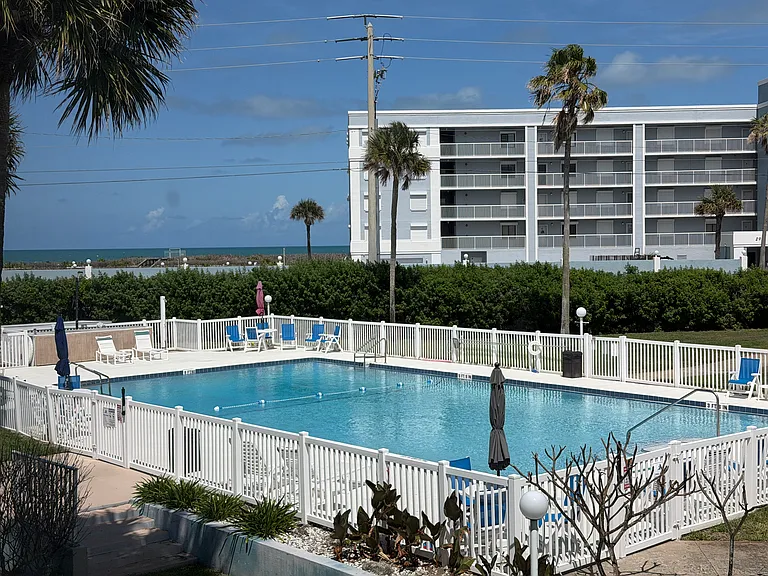 View of the pool (and the ocean), from "your" unit
