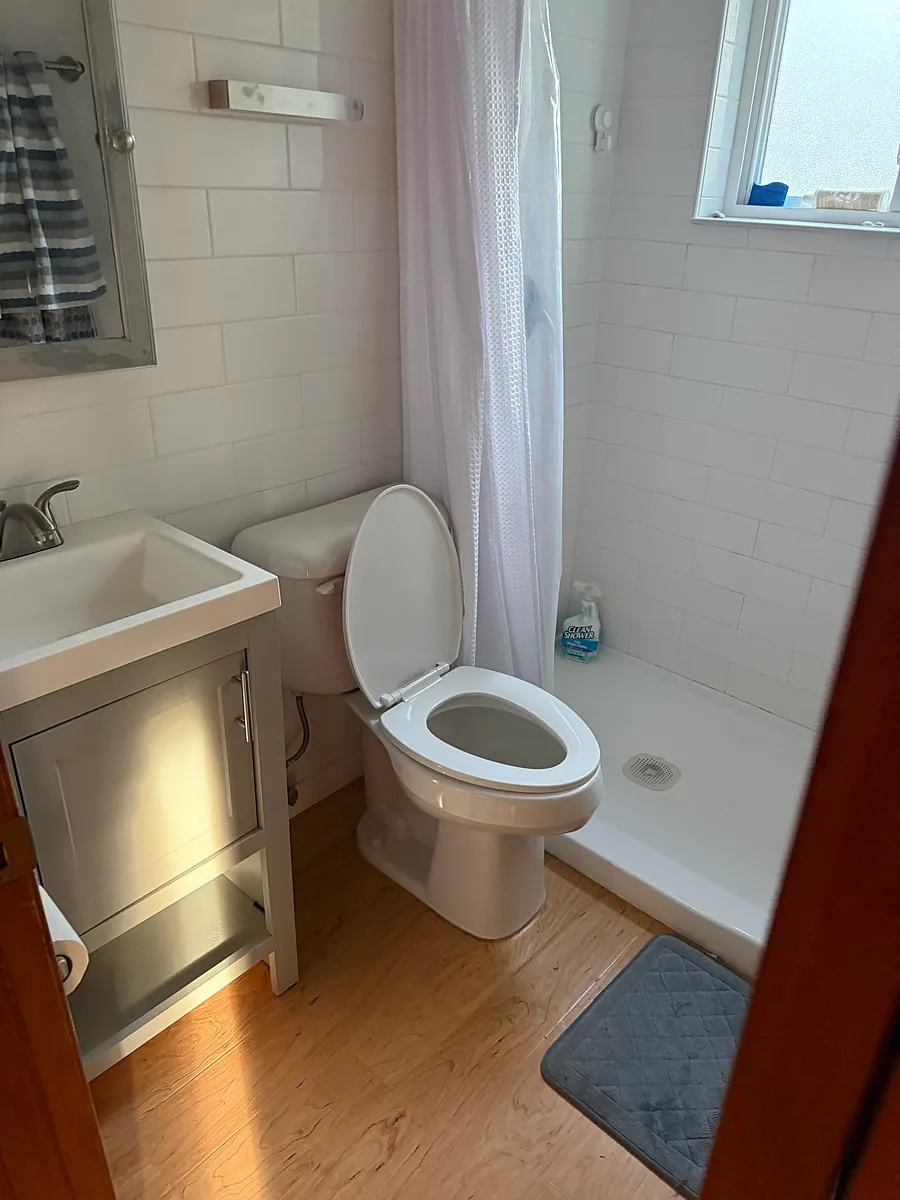 bathroom with shower- (ample shelving for storage not pictured here) - NW Overlook Dr