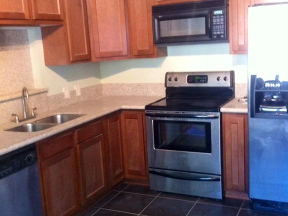 kitchen with granite and new cabinets