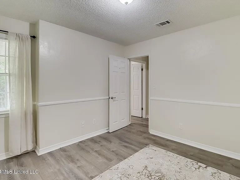 9228 Pointe Aux Chenes Rd — Photo 10