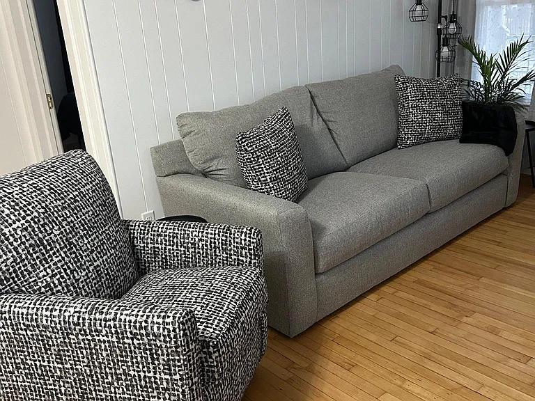 A soft comfortable sofa and chair in your private living room.