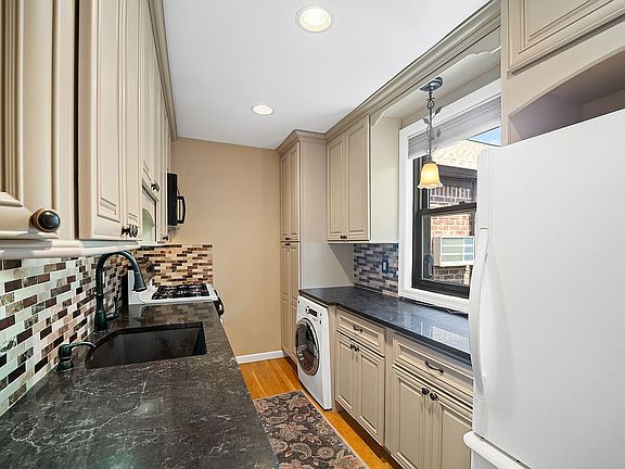 2nd image of 58-48 246th Cres #U