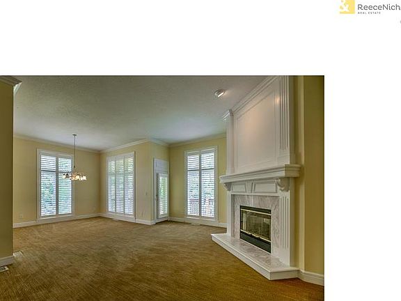 Formal Living room and Dining room.  Door exits to deck.