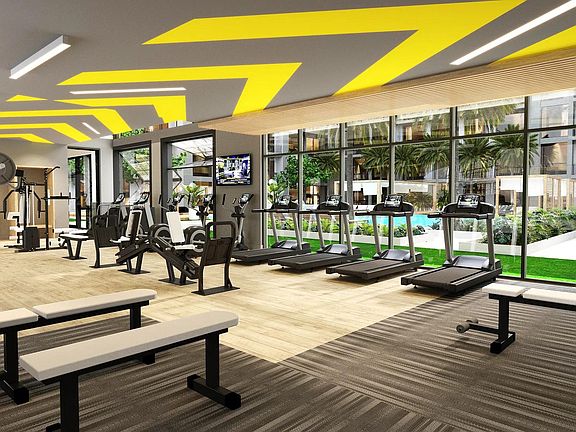 Club-quality fitness studio with spin bikes, sauna, and activity lawn.
