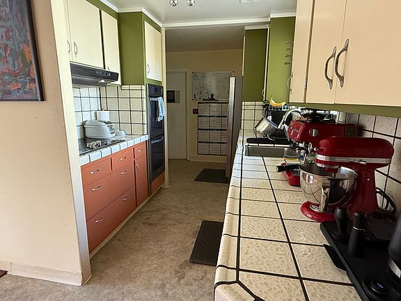 Kitchen - stove, oven, refridgerator, toaster oven, air fryer, dishwasher, espresso maker, electric kettle, mixer - not shown: Laundry Facilities (Washer and Dryer)