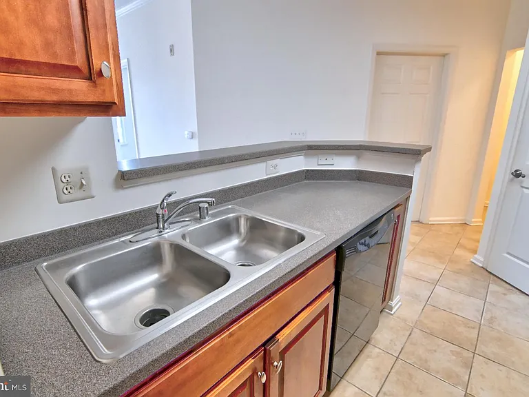 21216 McFadden Sq #108 — Photo 13
