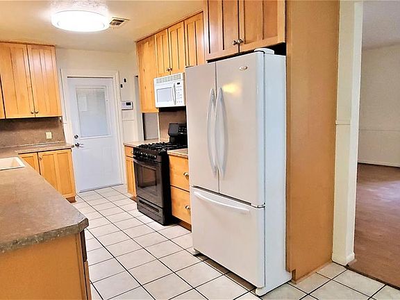 Note the updated kitchen cabinets. Lots of counter space.