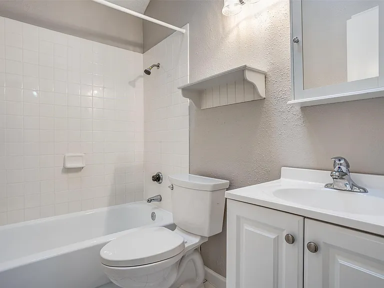 Hall bath has been updated and is located between bedrooms 2 & 3.