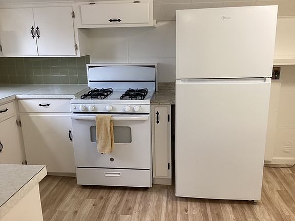 Range, Refrigerator, and washer hookup.