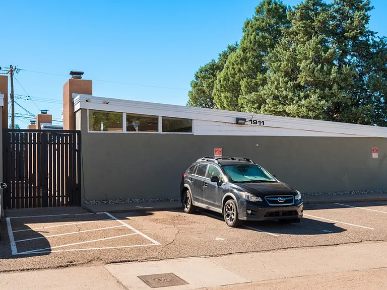 Two designated parking spaces, Keypad locked gate.