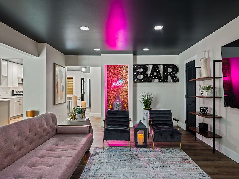 Spread out in this very spacious living room with built in bookcases that flank your large wall mounted TV. Feel proud to host your next game day or movie night in this gorgeous living room.