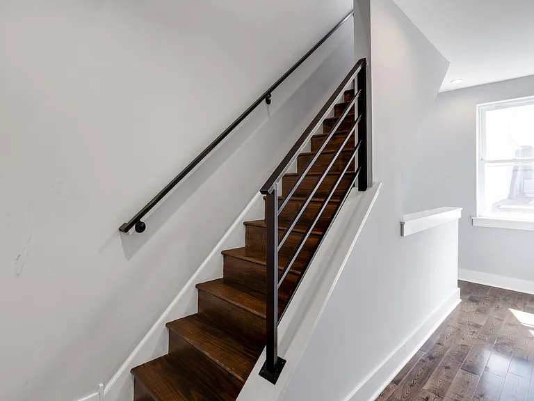 3rd floor/primary-suite level + stairs leading to the roofdeck