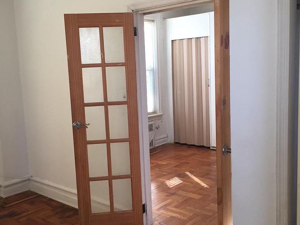 view from opposite side of bedroom toward living room with