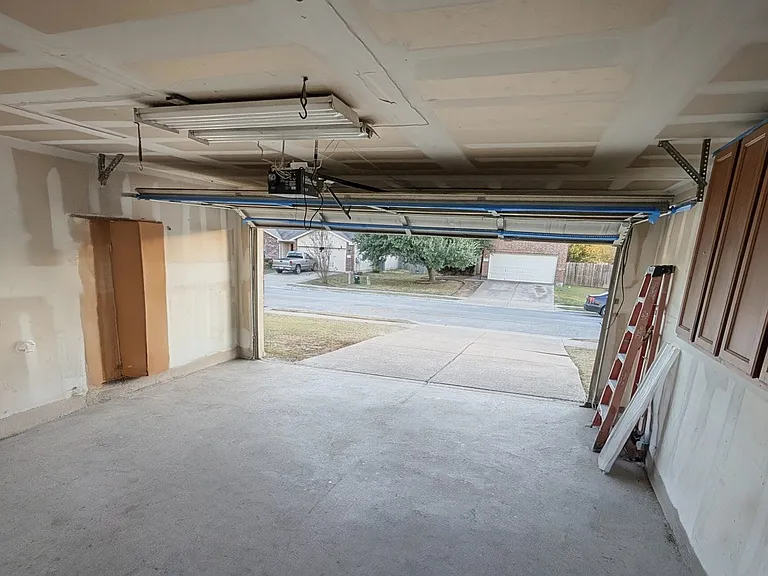2 car garage with Cabinets