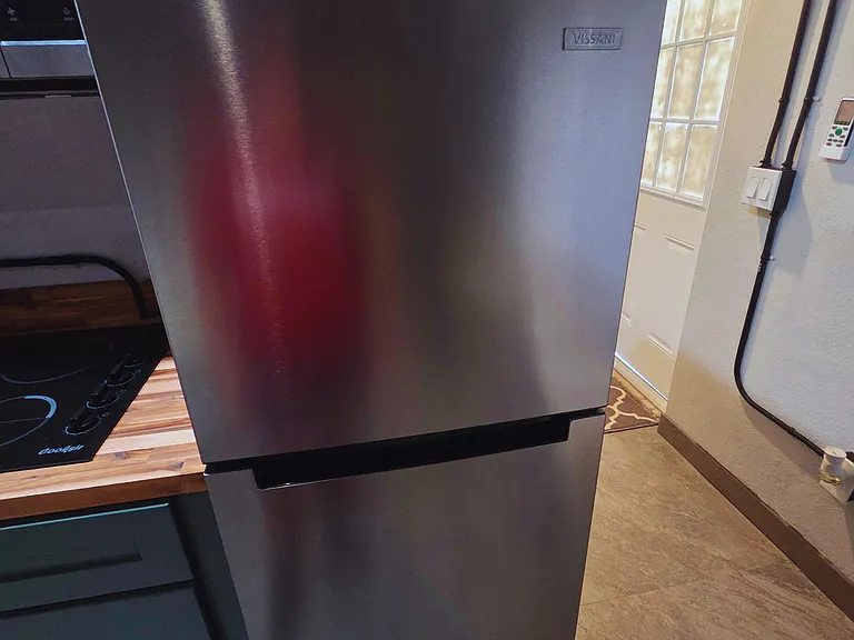 Enjoy a spacious refrigerator designed for convenience during your stay.