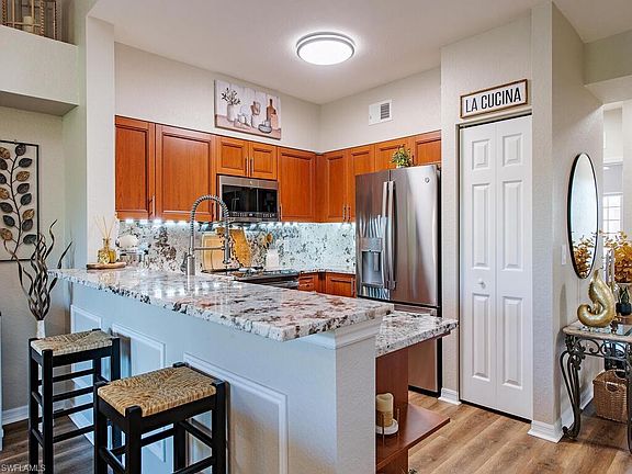 3rd image of 10110 Villagio Palms WAY #203