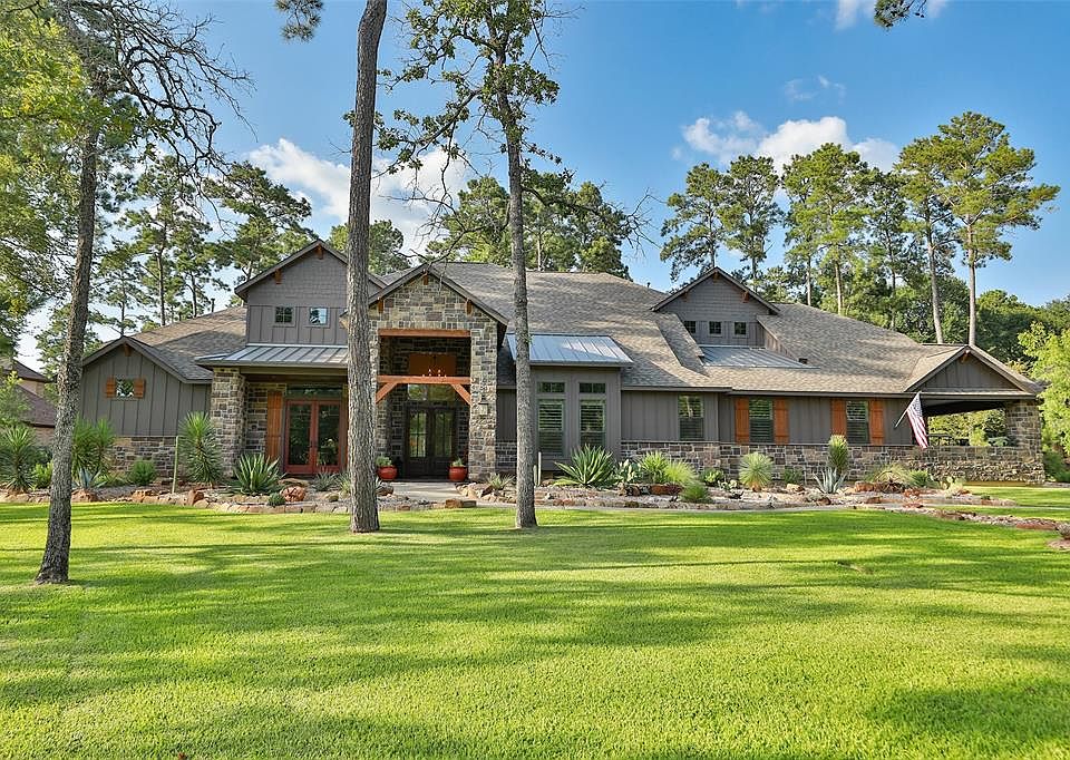 GORGEOUS CUSTOM HOME ON 1.375 ACRES PER MCAD! LOCATED ON THE 5TH GREEN OF THE HIGHLY ACCLAIMED HIGH MEADOW RANCH GOLF COURSE. PAR 3 HOLE! NO CART PATH BEHINDS ADDS TO THE PRIVACY !! TIERED LANDSCAPING, 15 ZONE SPRINKLER SYSTEM CONTROLLED BY WIFI! THI