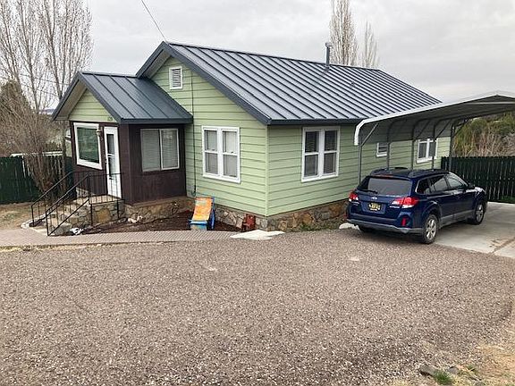 front of house from uphill angle