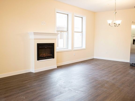 Electric fireplace in the living room/dining area (second fl