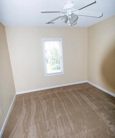 Guest Bedroom 1 - all bedrooms have ceiling fans with wall switch controls.