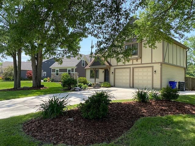 3141 Asbury , two car attached garage with storage, large concrete driveway, fenced yard, UA Schools.