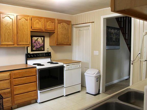 Kitchen, basement access.