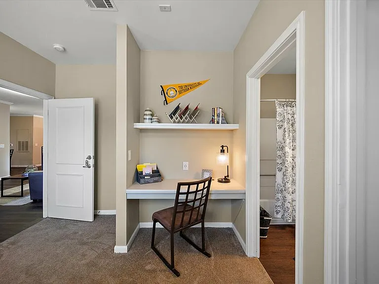 Stay Productive with a Built-In Desk and Shelving at Eagle Flatts Student Apartments in Hattiesburg