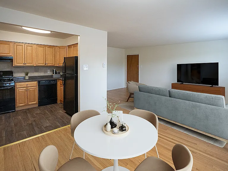 Kitchen leading into dining and living area