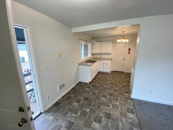 Front entrance and kitchen.