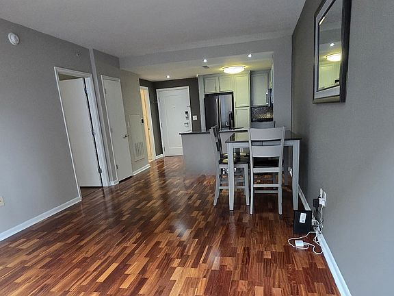 View of living/dining area and kitchen