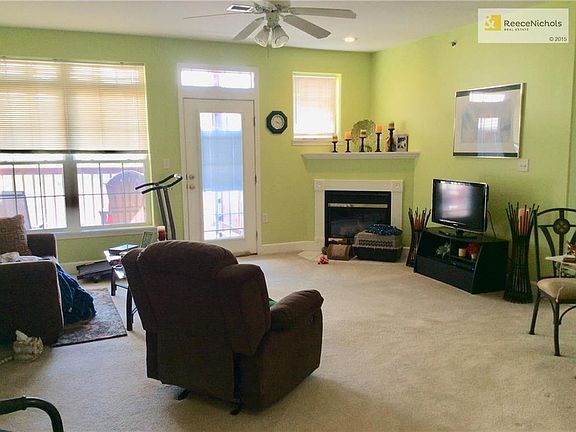 Living room is spacious and has southern exposure.