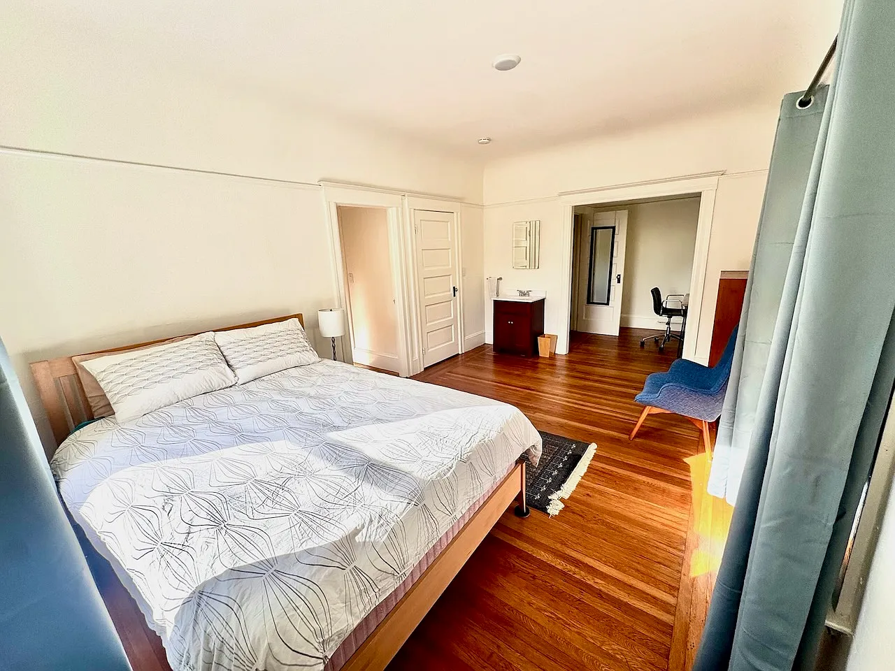 Rental bedroom with sink and office nook