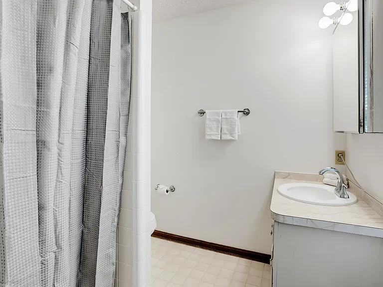 third bedroom ensuite bath. Stand up shower.
