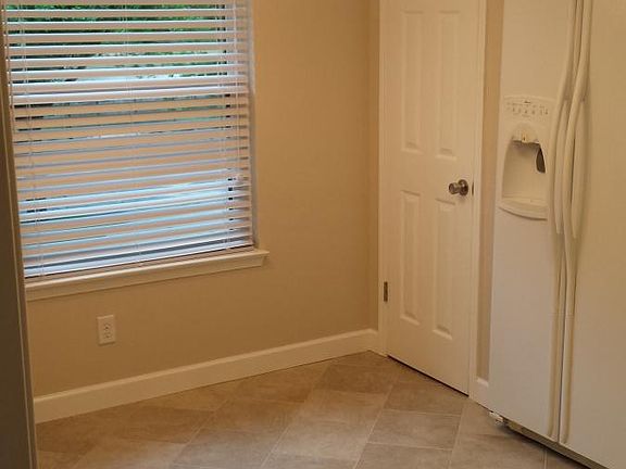 Eat-in kitchen with pantry to the right.