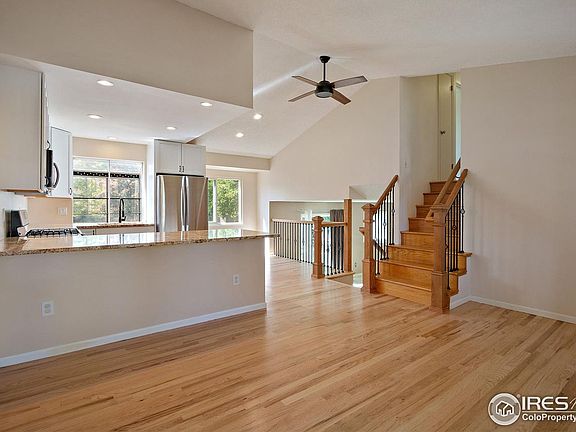 Living room and Kitchen , stairs up and down
