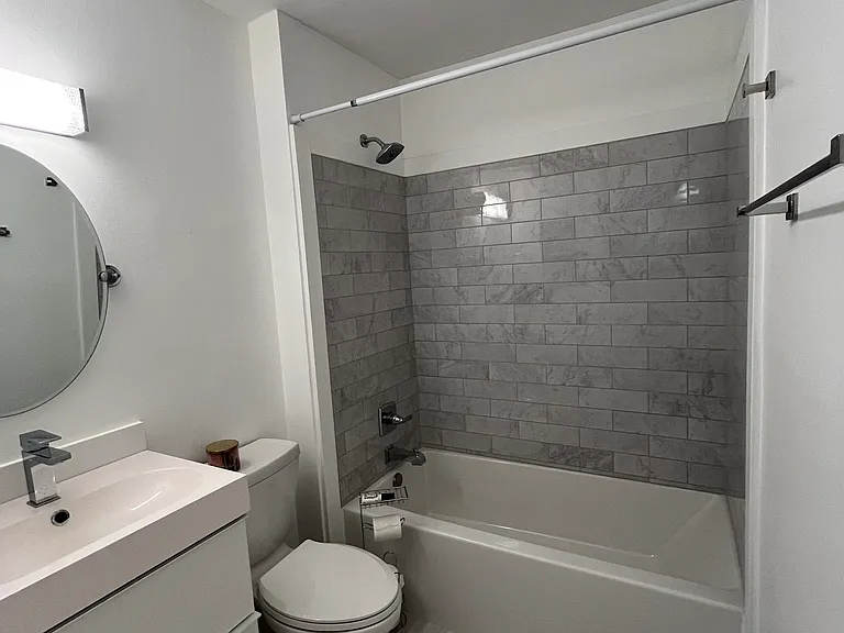 guest bathroom with tub