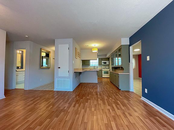 Looking into the breakfast area/kitchen from living room