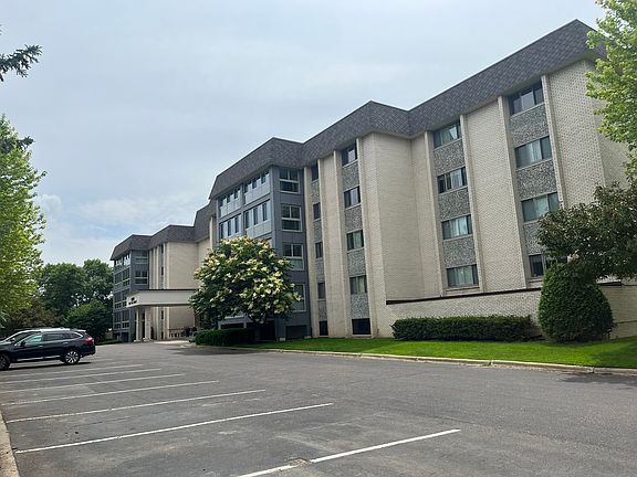 Ample visitor parking is available in the lot and on surrounding side streets.