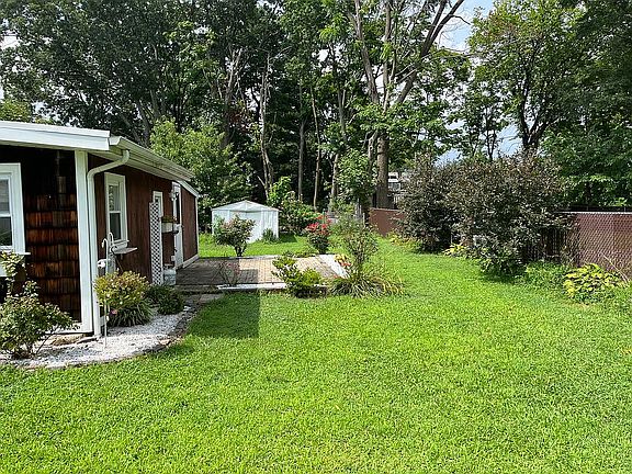 Side yard and cottage patio