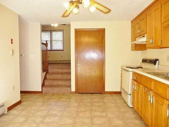 Stairs between Living Room/Kitchen