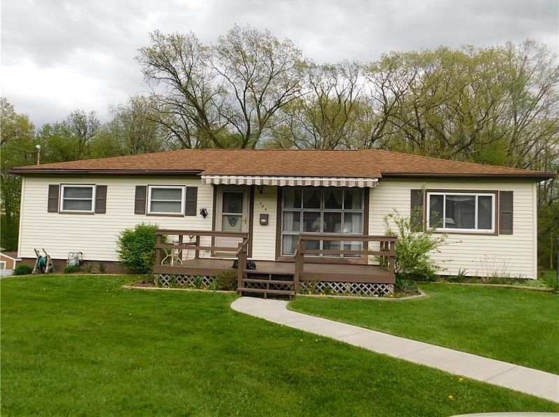 NICE FRONT PORCH/DECK W/AWNING.