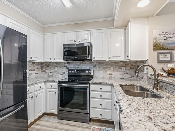 4th image of 9581 Shore Dr. #120