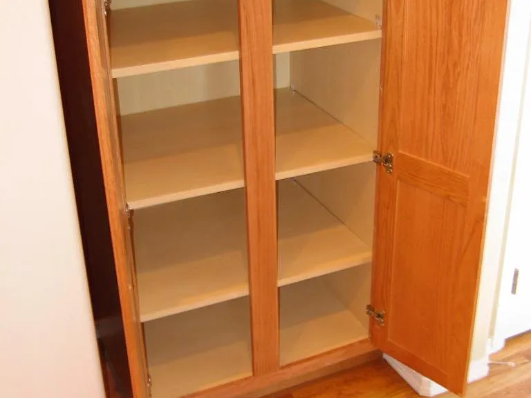 Kitchen storage with solid wood.