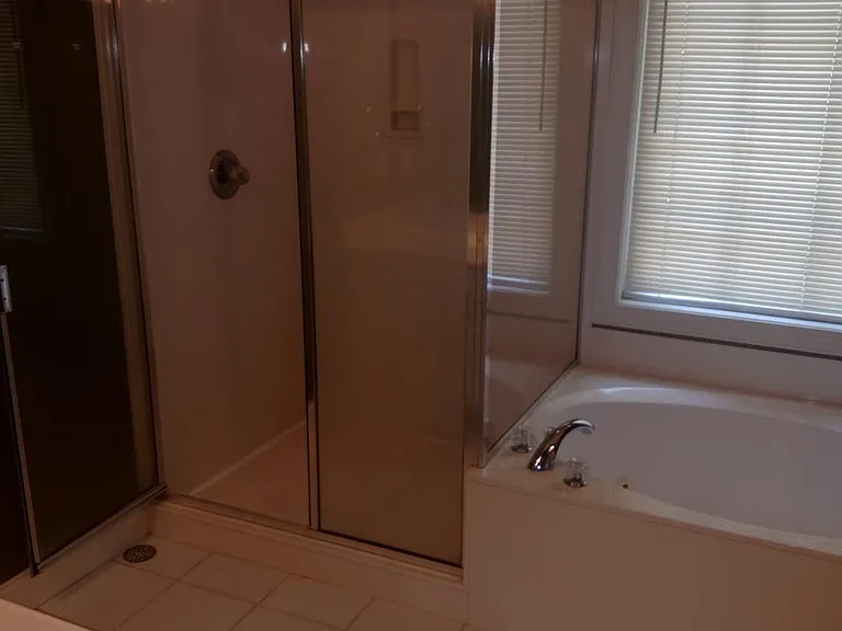 Master Bath with shower, jetted tub, toilet closet and 2 sep