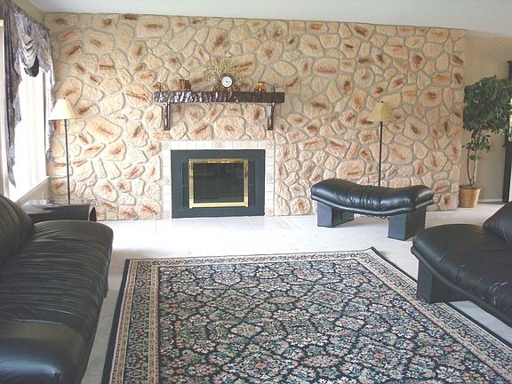 Stone wall fireplace.