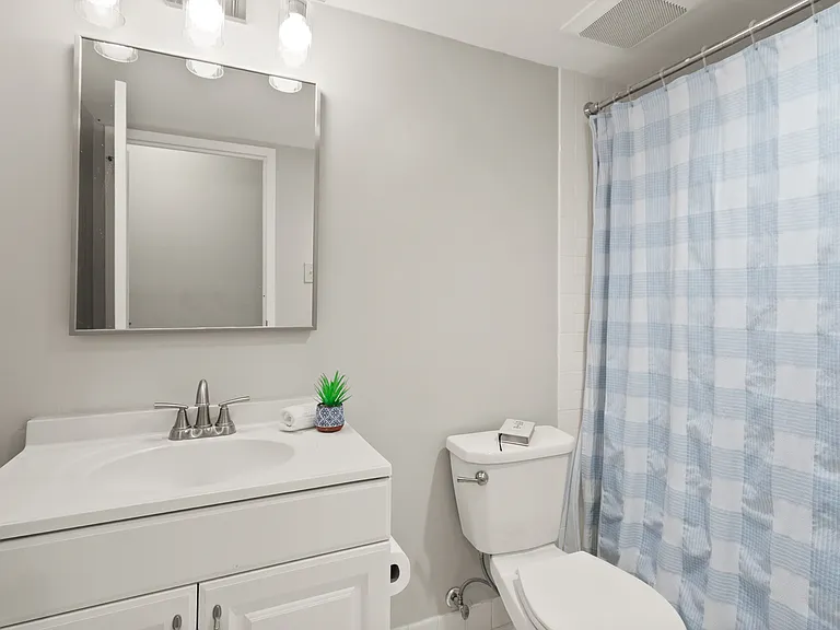 Primary bathroom with renovations in 2020 and 2026.